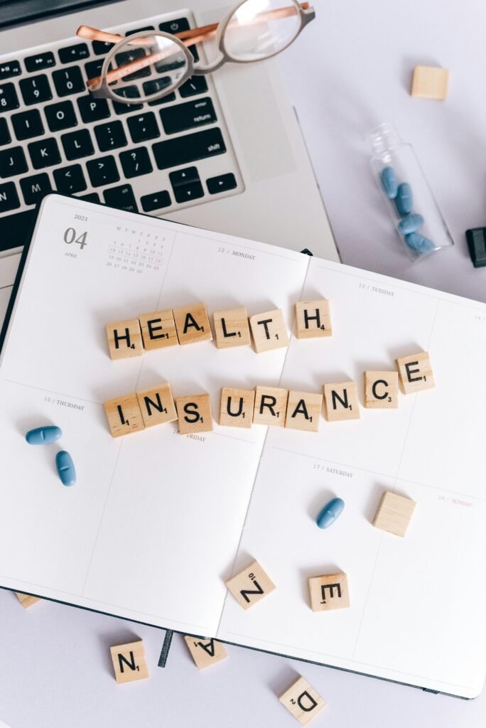 Health Insurance Scrabble Tiles on Planner